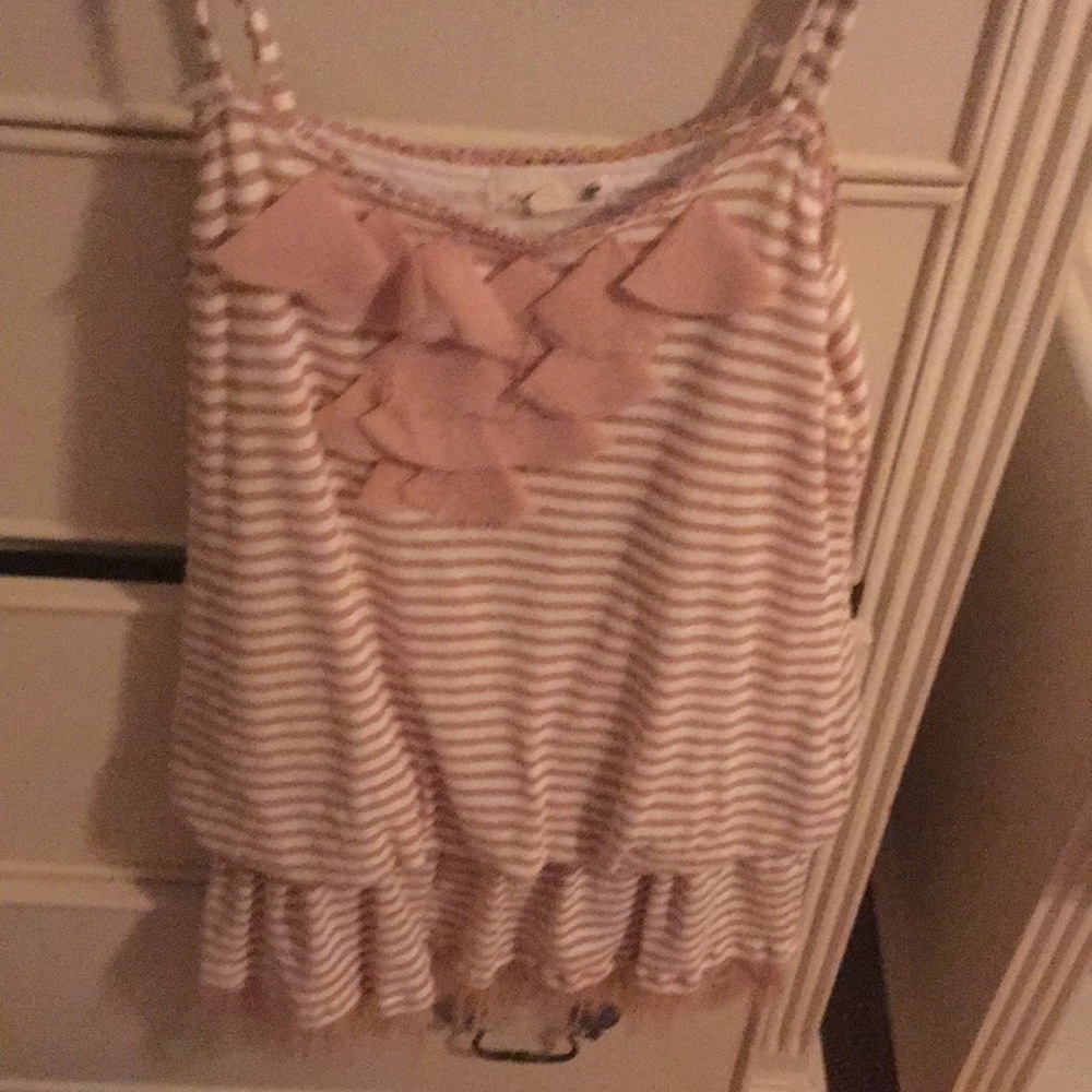 A tan and white stripped blouse